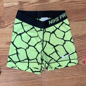 Green and Black NIKE PRO shorts